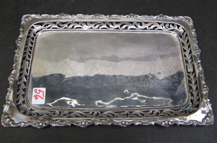 Appraisal: A CONTINENTAL FINE SILVER RECTANGULAR TRAY the border pierced chased