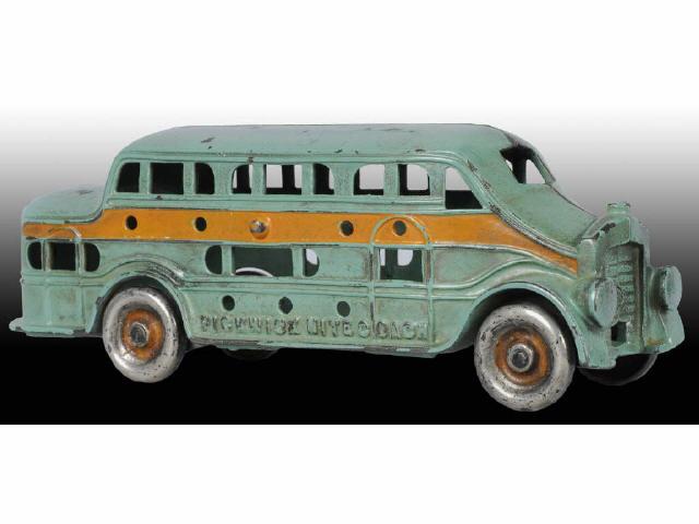 Appraisal: Cast Iron Kenton Pickwick Nite Coach Bus Toy Description Two