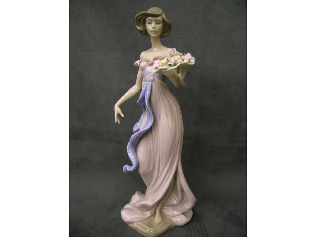 Appraisal: Lladro Porcelain Spring Flirtation figure depicting girl with flowers tall