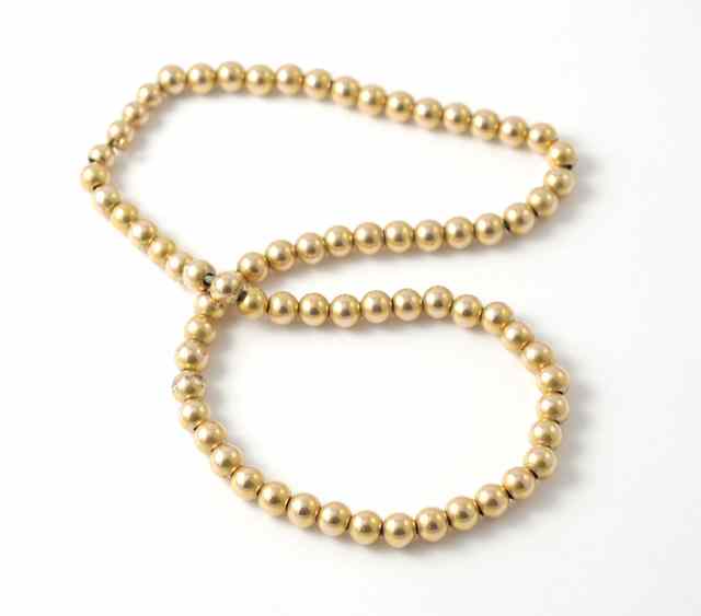 Appraisal: FOURTEEN KARAT YELLOW GOLD BEAD NECKLACE Length - inches gross