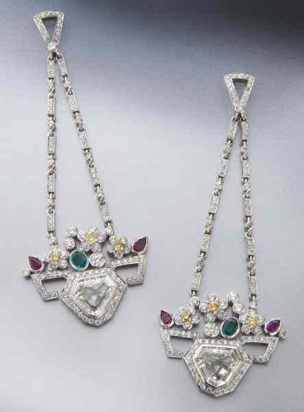 Appraisal: Art Deco platinum diamond emerald ruby earringsfeaturing a pair of