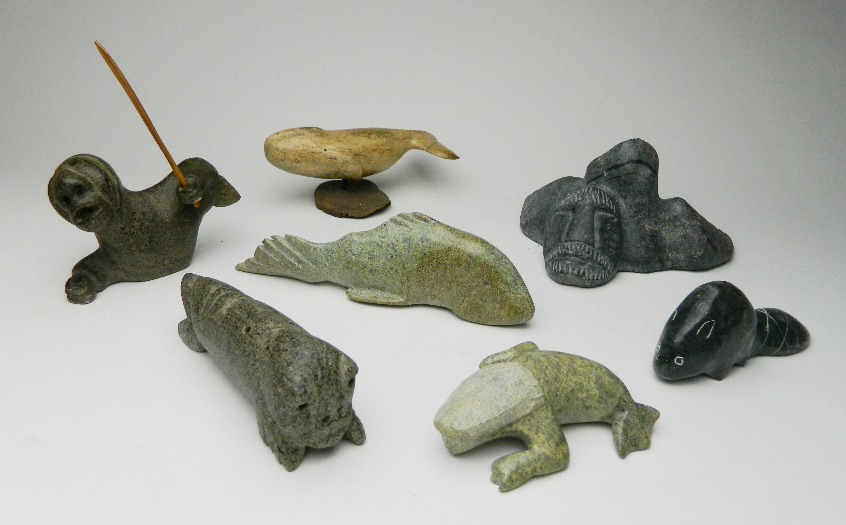 Appraisal: Inuit stone carvings Nengeorapik Lake Harbour- Beluga Whale- base missing