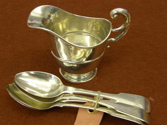 Appraisal: Four George IV silver fiddle pattern teaspoons London and a