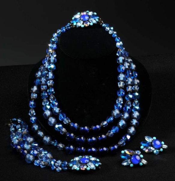 Appraisal: Signed Hobe Parure Description Consists of three-strand glass beads necklace