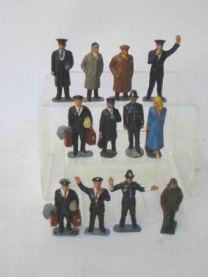 Appraisal: Eleven English metal railway figures and a Johillco airman F-G