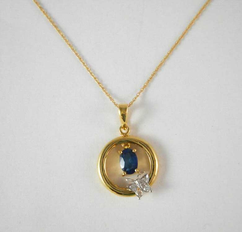 Appraisal: SAPPHIRE AND DIAMOND PENDANT NECKLACE with an inch k yellow