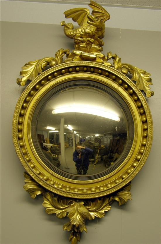 Appraisal: Early th century convex wall mirror with dragon top diameter