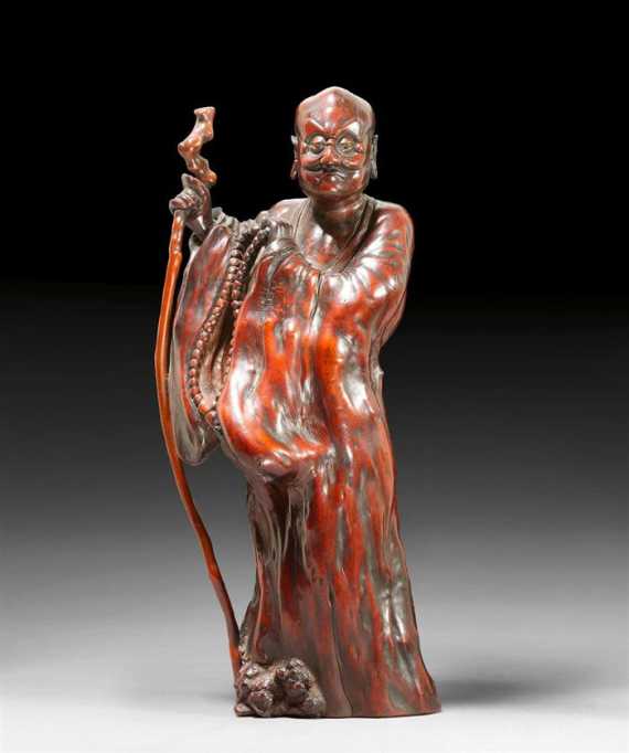 Appraisal: AN ELEGANT ROOT WOOD FIGURE OF A STANDING SENNIN Japan