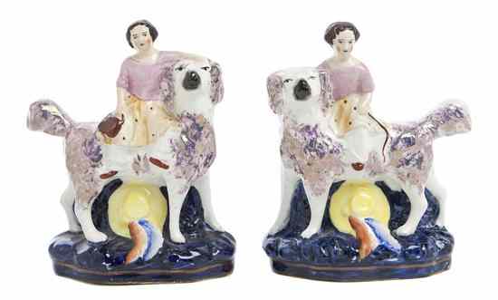 Appraisal: A Pair of Staffordshire Figural Groups each depicting a girl