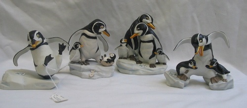 Appraisal: A COLLECTORS GROUP OF FOUR FRANKLIN MINT PORCELAIN PENGUIN FIGURES