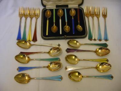 Appraisal: A NORWEGIAN GILDED PART DESSERT SET comprising ten spoons and