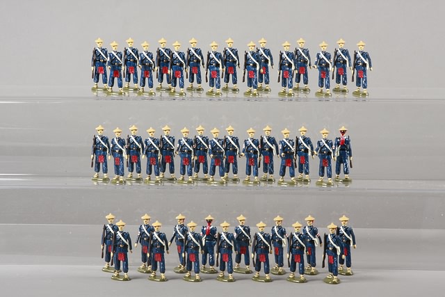 Appraisal: Lot of metal figures representing Chinese Imperial Infantry marching gloss