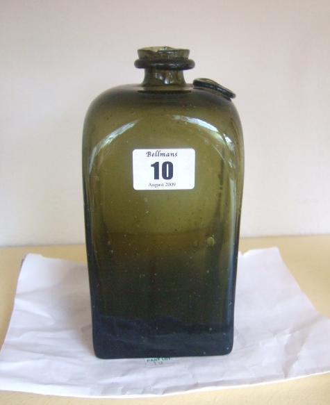 Appraisal: A green glass gin bottle th century with seal stamp