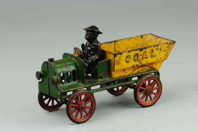 Appraisal: HUBLEY COAL TRUCK Early transitional truck cast iron painted in