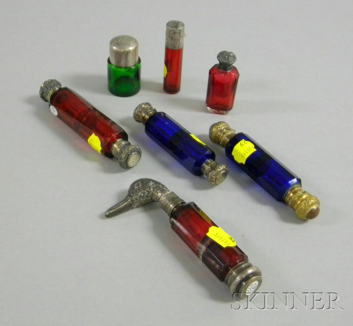 Appraisal: Seven Metal-mounted Colored Glass Perfumes four ruby two cobalt and