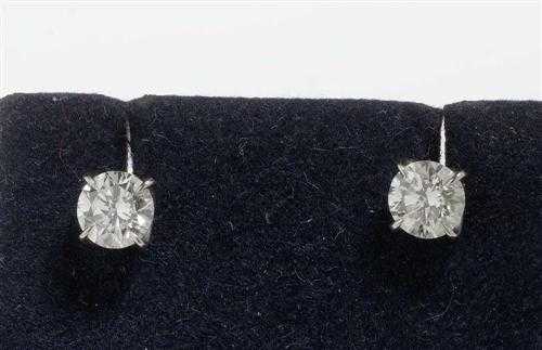 Appraisal: BRILLIANT-CUT DIAMOND STUD EARRINGS Platinum Classic stud earrings each set