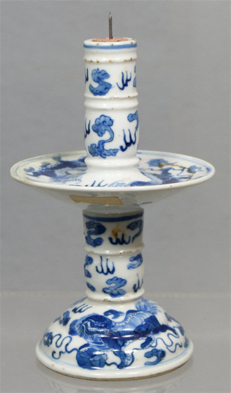 Appraisal: th c possibly earlier Chinese porcelain candlestick repaired on rim