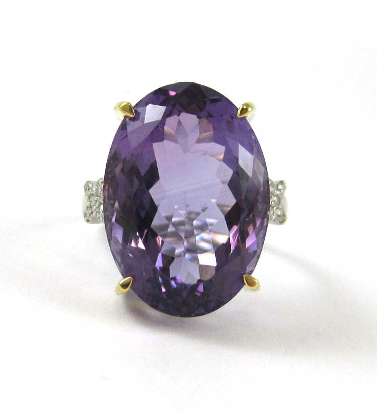 Appraisal: AMETHYST DIAMOND AND FOURTEEN KARAT GOLD RING The white and