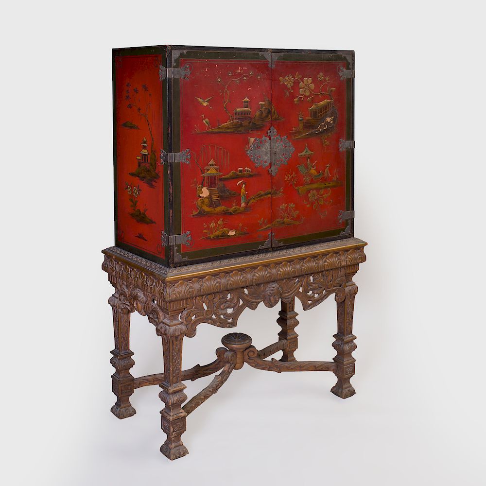 Appraisal: Metal-Mounted Red Lacquer and Parcel-Gilt Cabinet on a Continental Carved