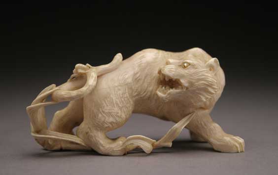 Appraisal: ANTIQUE IVORY OKIMONO Antique and well carved ivory okimono of