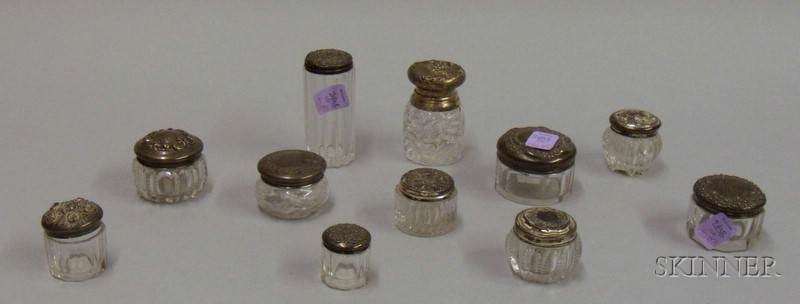 Appraisal: Eleven Small Sterling Covered Glass Jars ht to in