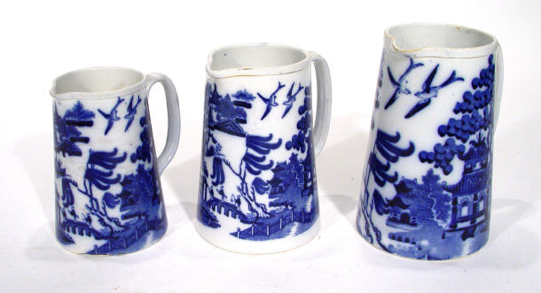 Appraisal: Graduated set of three Mintons Pottery jugs transfer printed with