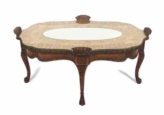 Appraisal: A Continental Marquetry Low Table th century the shaped oval