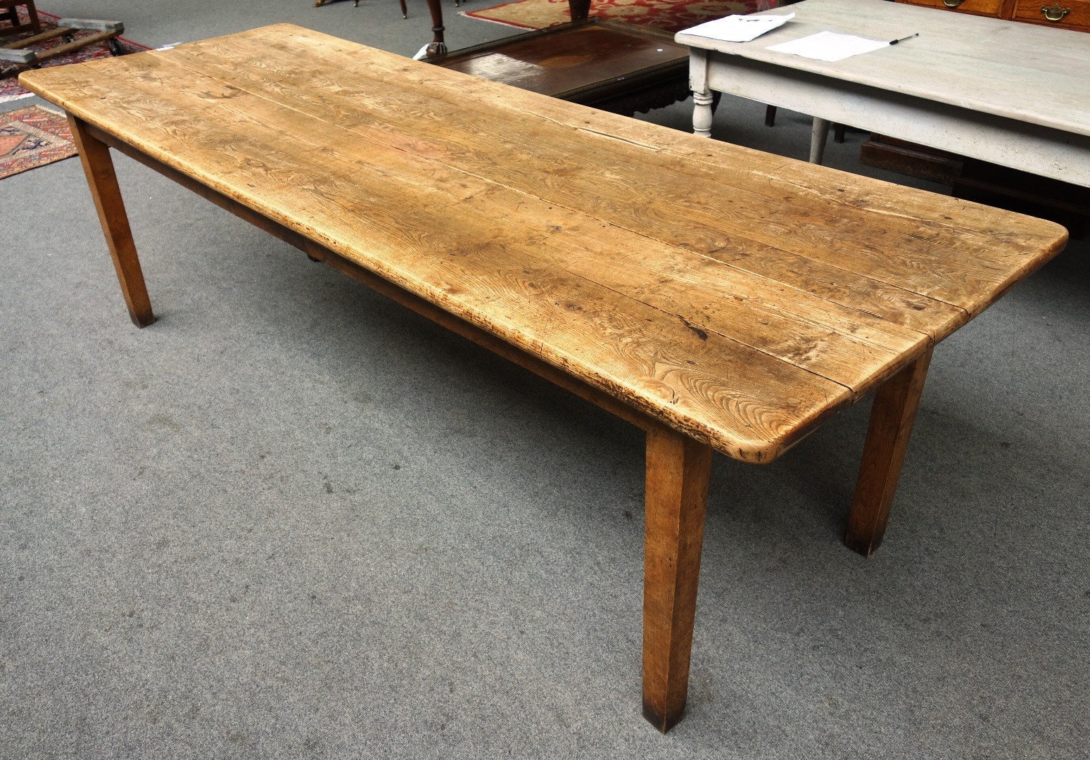 Appraisal: A th century kitchen table the elm plank top on