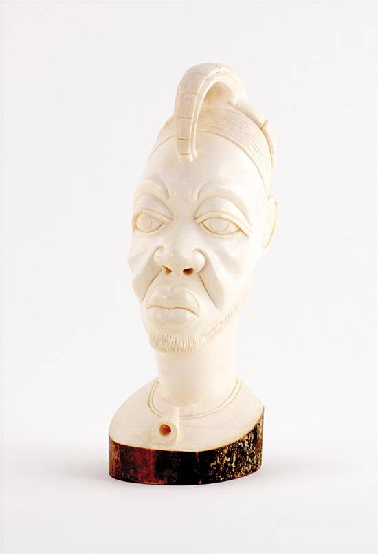 Appraisal: African carved ivory bust of Nubian ornate headdress on somber