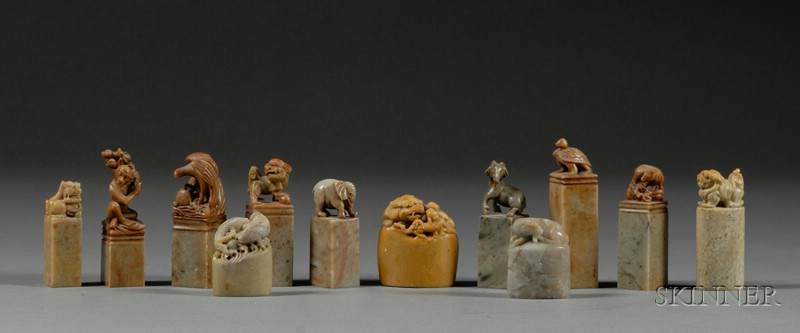 Appraisal: Twelve Soapstone Seals China late th century animal-form finials