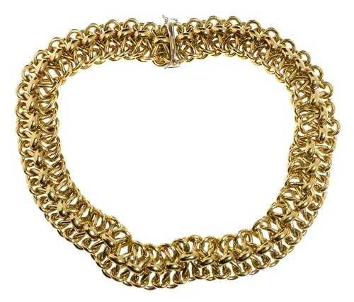 Appraisal: GOLD NECKLACE Yellow gold g Decorative broad necklace with fantasy