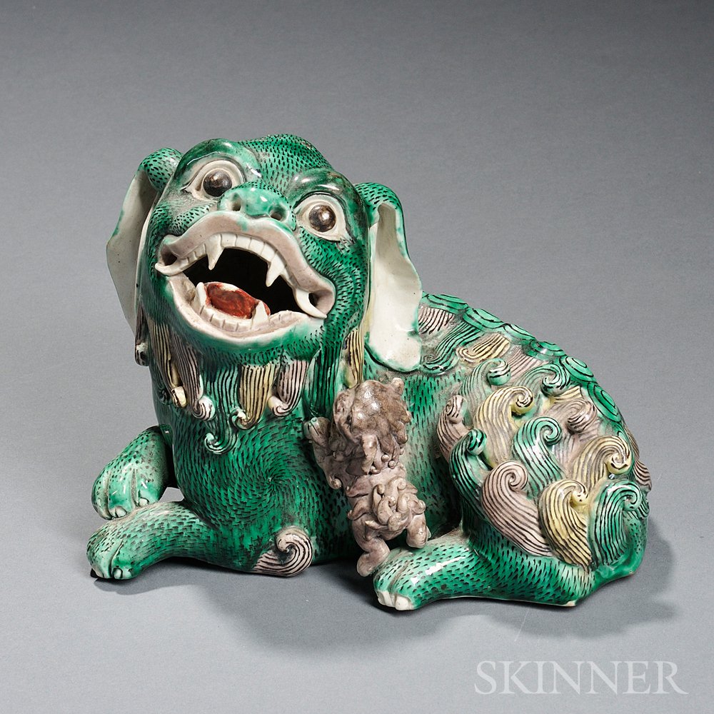 Appraisal: Sancai-style Ceramic Foo Lion with a Cub China seated with