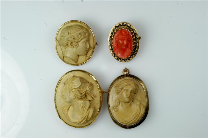 Appraisal: carved lava cameos coral cameo all unmarked one cracked Estimate