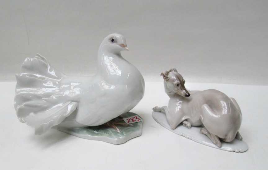 Appraisal: TWO ROSENTHAL PORCELAIN SCULPTURES greyhound in repose designed by Theodore