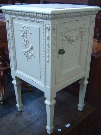 Appraisal: A th century French cream painted bed side table the