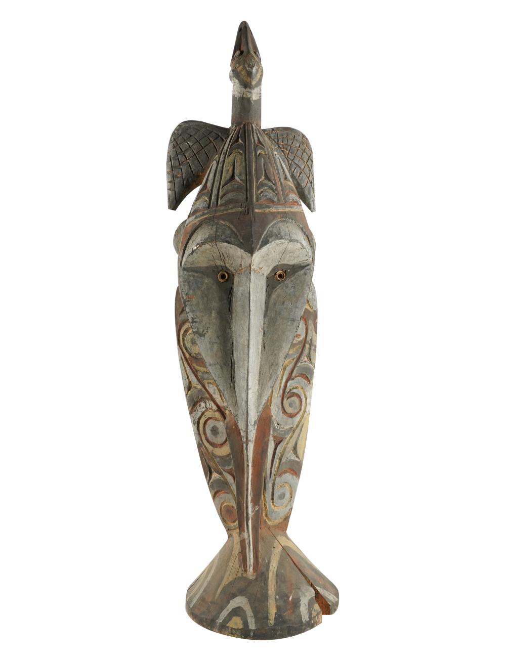 Appraisal: CARVED POLYNESIAN-STYLE FIGURAL MASKwith eagle finial Condition chip to base