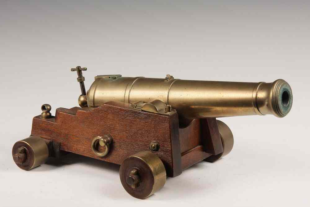 Appraisal: MINIATURE CANNON - th c Miniature of an th c