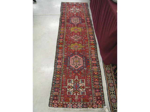 Appraisal: Heriz Persian Handmade Runner central medallions red field ' x