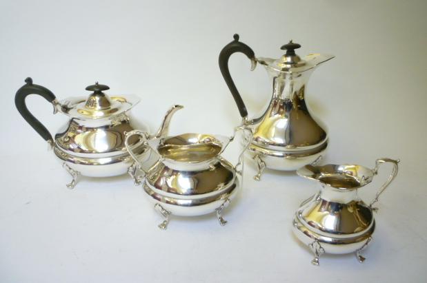 Appraisal: AN EDWARDIAN FOUR PIECE TEA SERVICE maker Barraclough Barraclough Sheffield