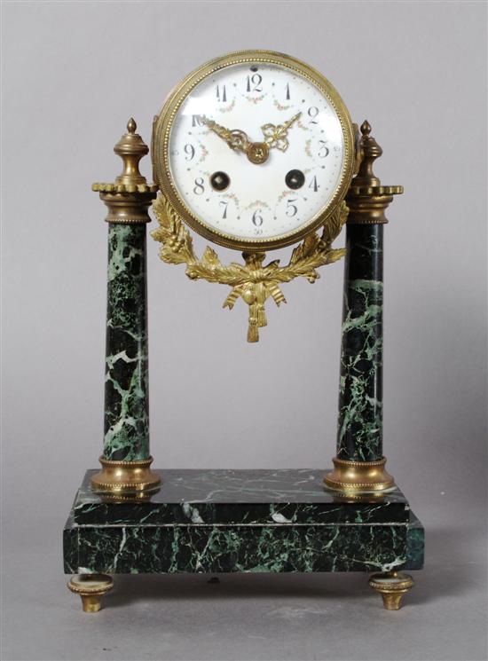 Appraisal: A French Marble and Gilt Bronze Garniture Clock Height x