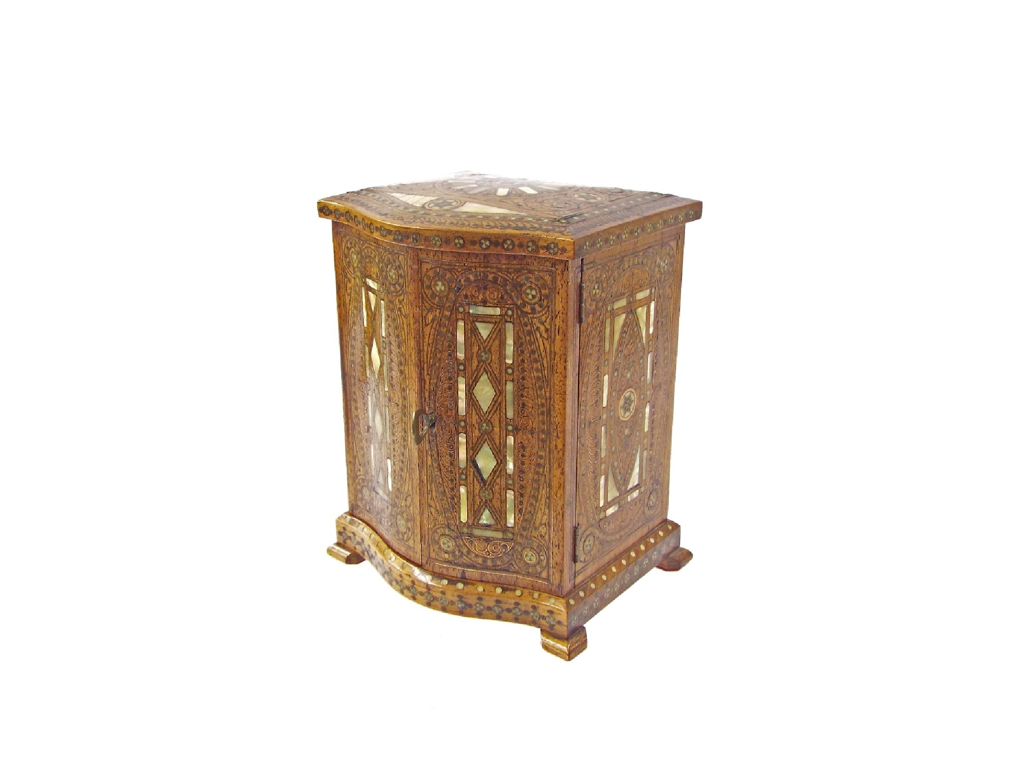 Appraisal: Decorative Eastern inlaid bow fronted specimen cabinet decorated all over