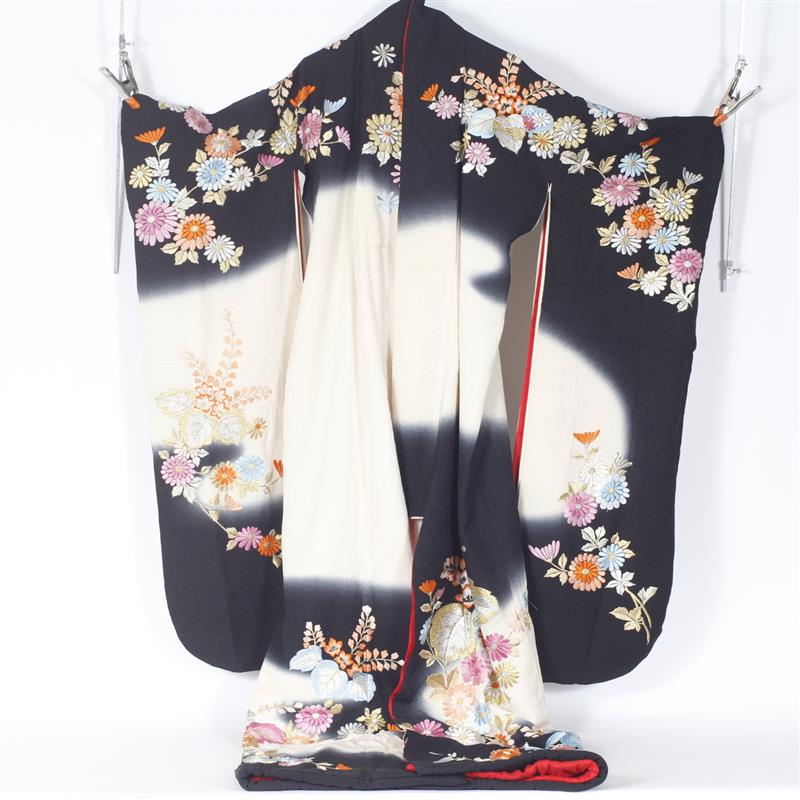 Appraisal: Japanese Polychrome Silk Embroidered Bridal Kimono featuring flowers on a