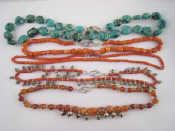 Appraisal: A mixed lot comprising three coral bead necklaces a cornelian