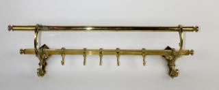 Appraisal: Polished Brass coat rack from a train Polished brass coat