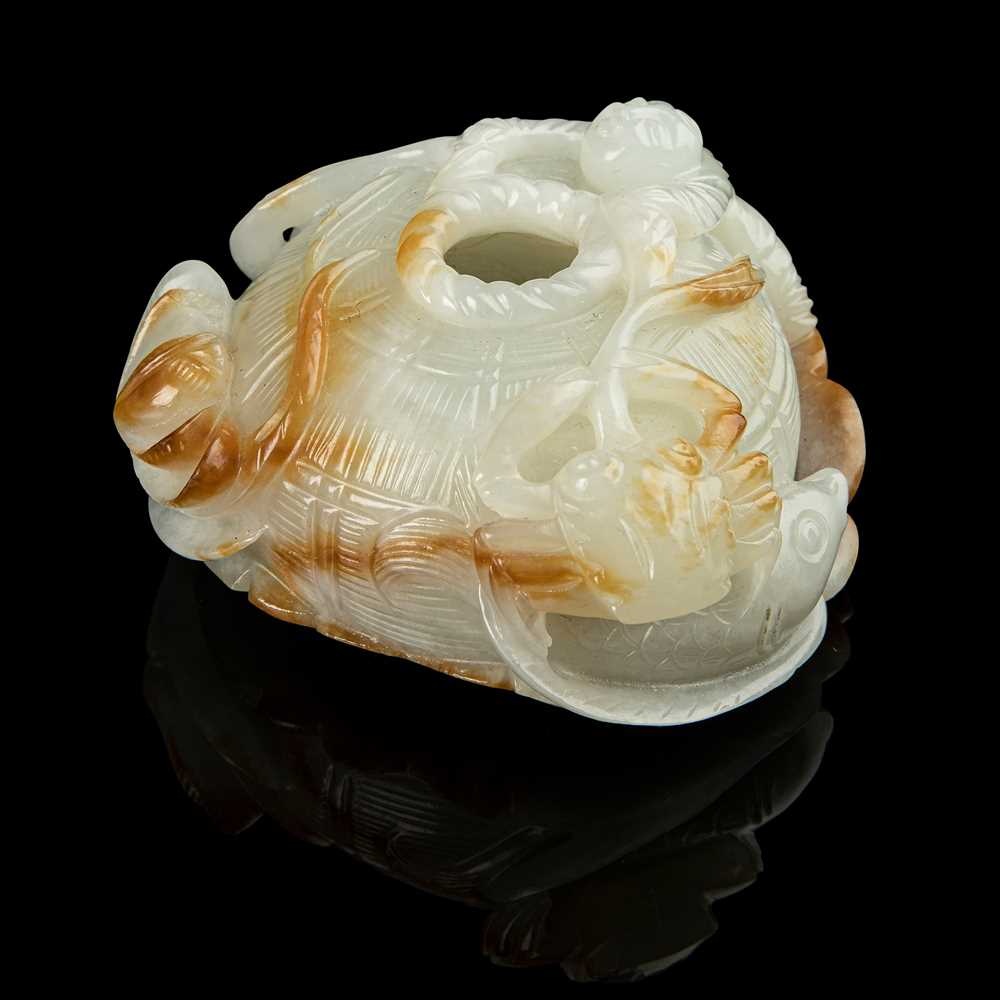 Appraisal: WHITE JADE WITH RUSSET SKIN CARVING OF WATER POT QING