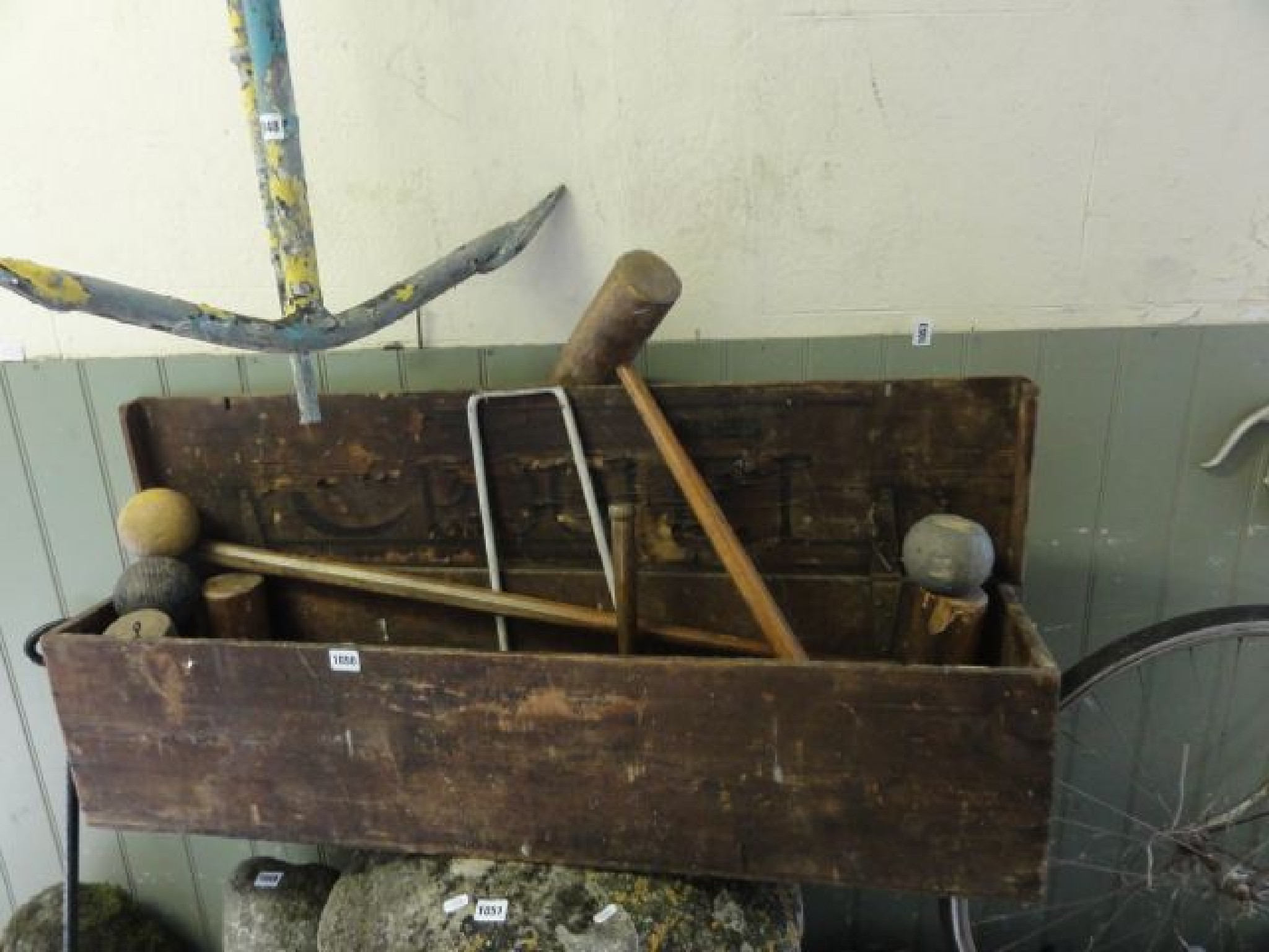 Appraisal: A vintage boxed croquet set with hinged lid bearing the