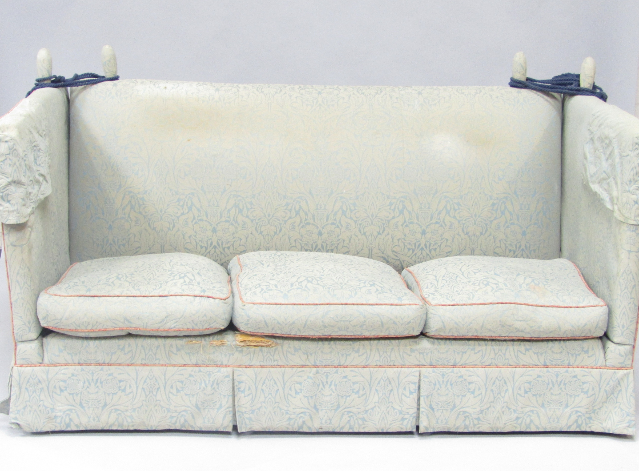 Appraisal: A Knowle settee three seater upholstered in blue floral patterned