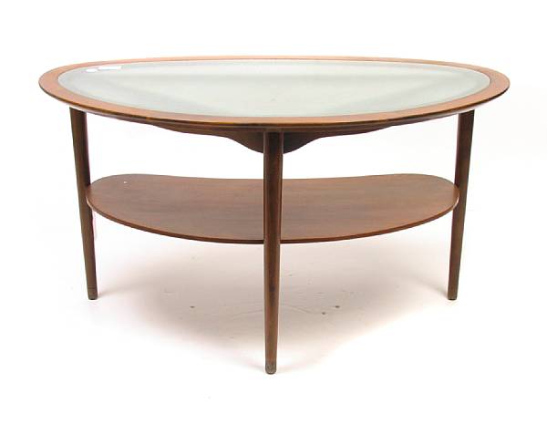 Appraisal: A Danish modern bi-morphic walnut occasional table height in width