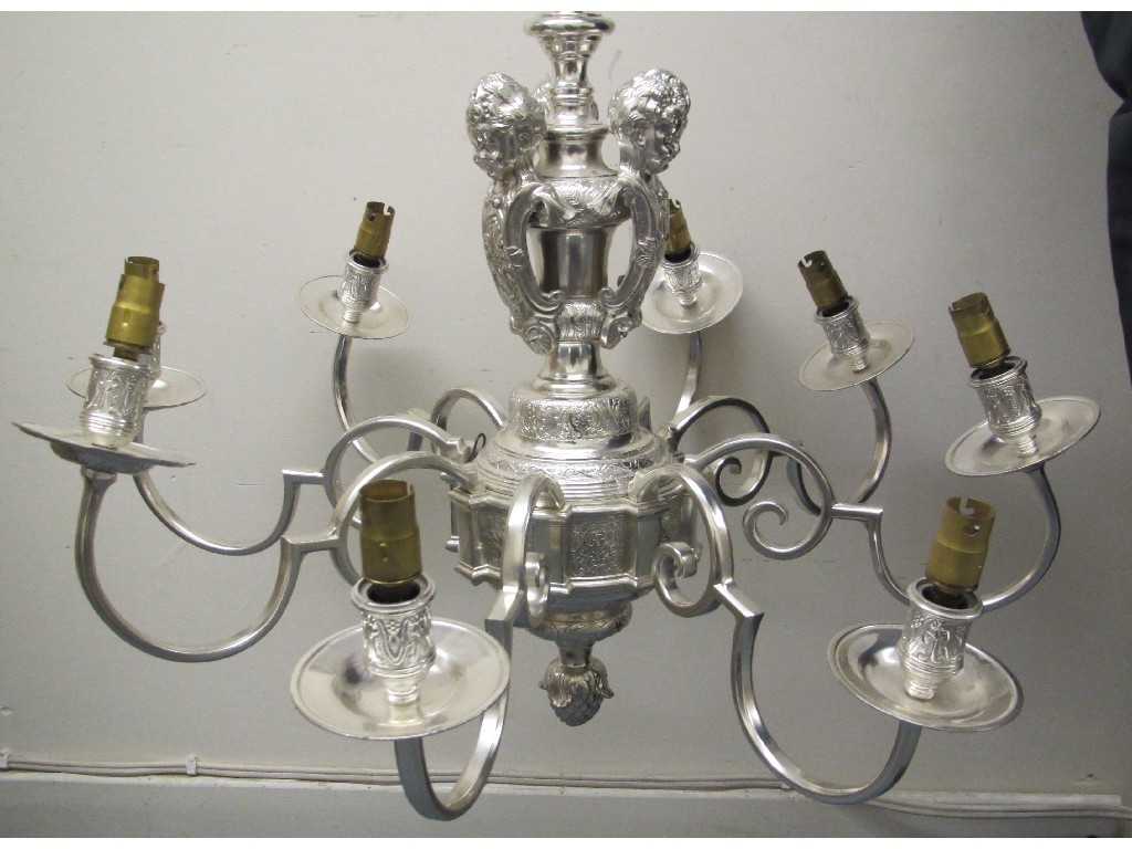 Appraisal: A pair of electroplated brass eight branch chandeliers of Georgian