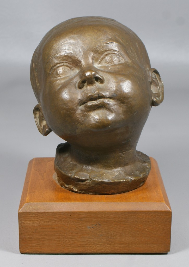 Appraisal: th c bronze head of a child signed illegibly mounted